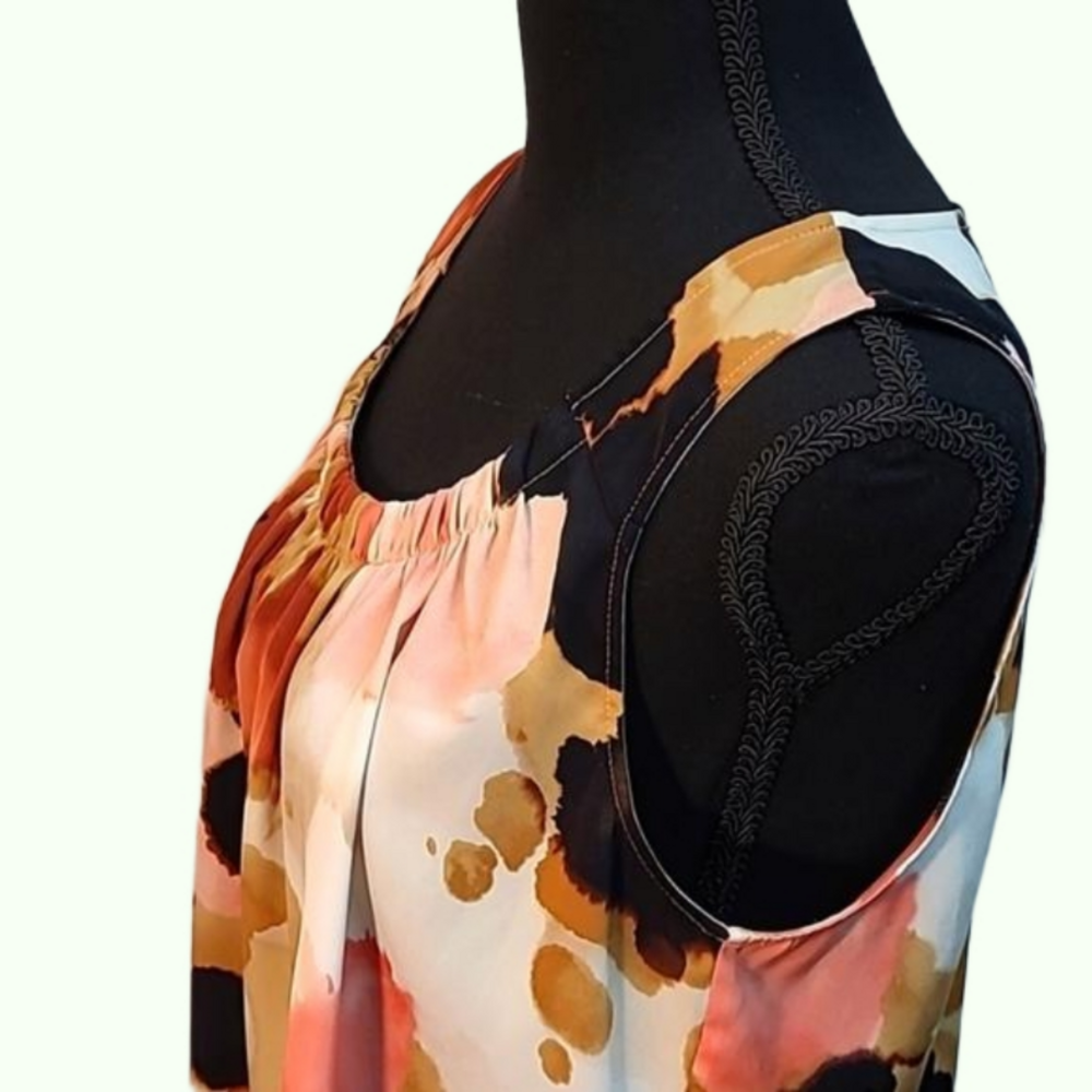 Chicos sleeveless silky top. Ivory, peach, and browns. Size 1. - Picture 4 of 4